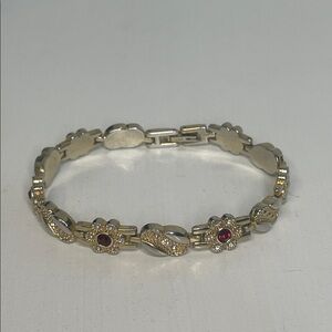 Gold and Silver Tone Floral Bracelet with Red & White Rhinestones. 7.5”